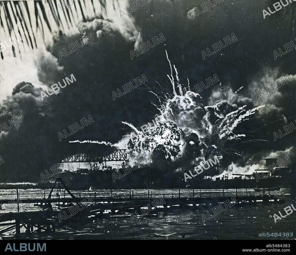 USS Shaw exploding during the Japanese raid on Pearl Harbor, T.H. December 7, 1941.