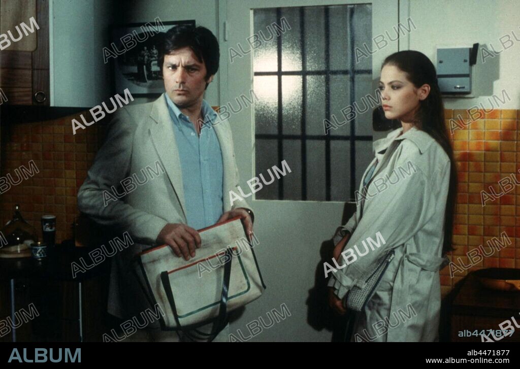 ALAIN DELON and ORNELLA MUTI in DEATH OF A CORRUPT MAN, 1977 (MORT D'UN POURRI), directed by GEORGES LAUTNER. Copyright ADEL PRODUCTIONS.