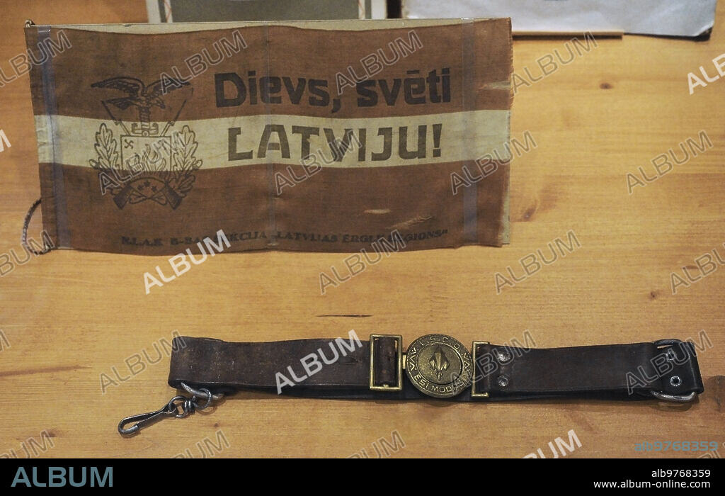 Standard of the "Legion of Latvian Eagles", Youth Section of the Discharged Soldiers of Latvia, with the motto "God Bless Latvia". Scout uniform belt. Latvian War Museum. Riga. Latvia.