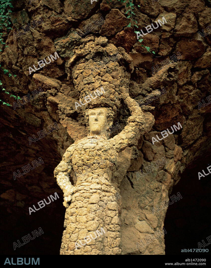 Antoni Gaudi (1852-1926). Catalan architect. Park Guell. The Laundry Room Portico. Sculpture of the Laundress. Barcelona. Spain.
