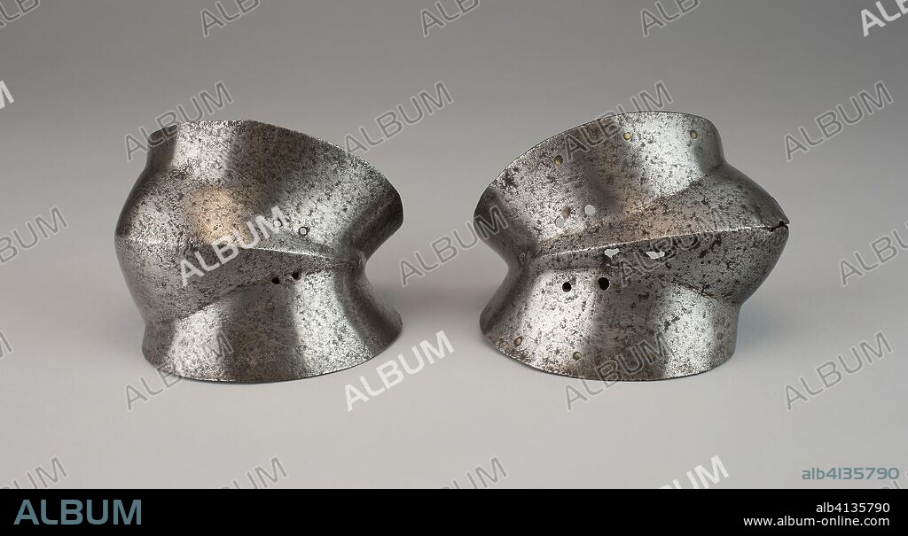 Cowter for the Left(?) Elbow from a Splint Rerebrace. Spanish. Date: 1450-1550. Dimensions: H 9.53 cm (3 3/4 in.); W 12.7 cm (5 in.); D 15.24 cm (6 in.). Steel. Origin: Spain.
