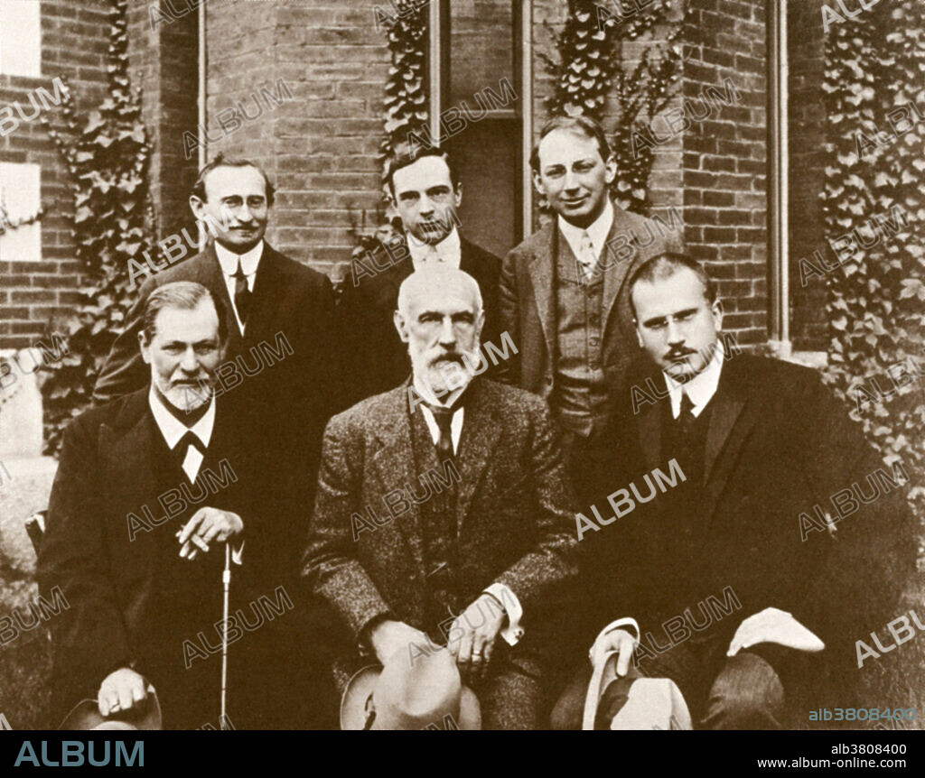 Psychoanalysts participating at Clark University Psychology Conference in 1909. At the invitation of Clark's President, Granville Stanley Hall (front row center), the celebrated European psychoanalysts C.G. Jung (front row right) and Sigmund Freud (front row left) visited America, where Freud delivered his first lectures in the country at Clark.