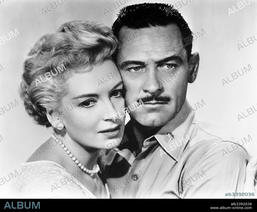 DEBORAH KERR and WILLIAM HOLDEN in THE PROUD AND PROFANE, 1956, directed by GEORGE SEATON. Copyright PARAMOUNT PICTURES.