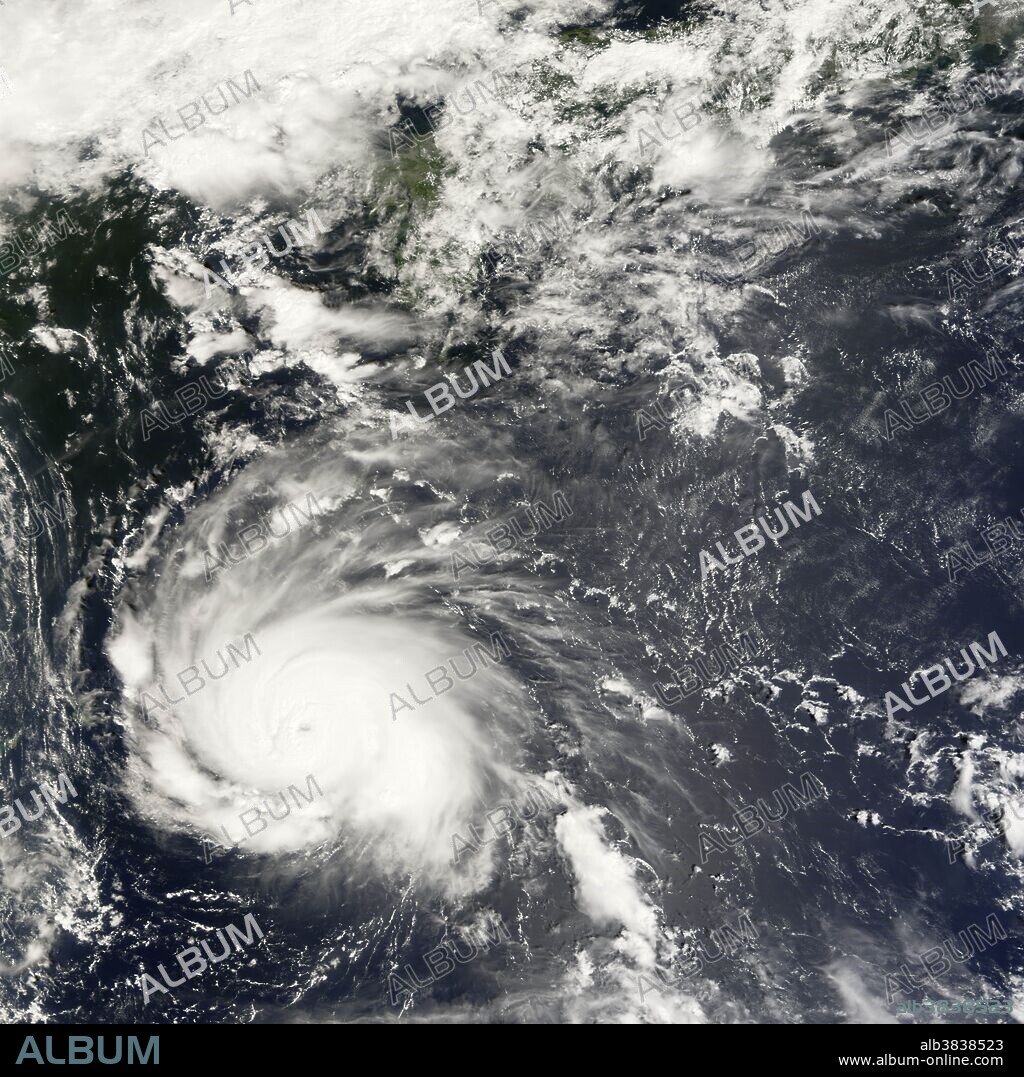 Typhoon Nari formed as a tropical storm near Okinawa on September 12, developing to typhoon strength the next day. The typhoon was forecast to swing through the East China Sea and bring stormy seas and rain to China, the Korean Peninsula, and Japan. By late in the day September 14, Nari had reached Super Typhoon status (as a Category Four strength typhoon) with peak winds measured at 220 kilometers per hour (135 miles per hour). However, the typhoon was out at sea and forecasts were calling for it to lose most of its strength well before coming ashore in Japan. The Moderate Resolution Imaging Spectroradiometer (MODIS) on NASA's Terra satellite acquired this photo-like image at 10:50 a.m. local time (01:50 UTC) on September 14, 2007. Typhoon Nari appears here as a well developed and distinct ball of circling clouds with a distinct though cloudy eye at its center. According to the Unisys Hurricane archive information, Nari had peak winds of around 120 km/hr (65 mph) and was classified a Category One typhoon.