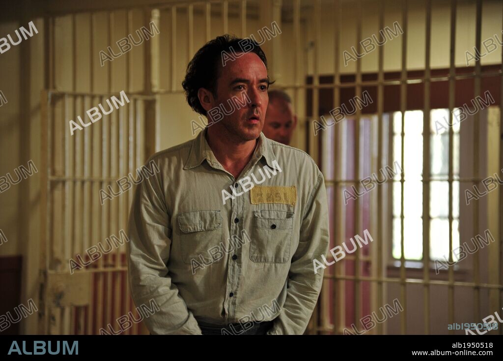 JOHN CUSACK en EL CHICO DEL PERIODICO, 2012 (THE PAPERBOY), dirigida por LEE DANIELS. Copyright BENAROYA PICTURES.