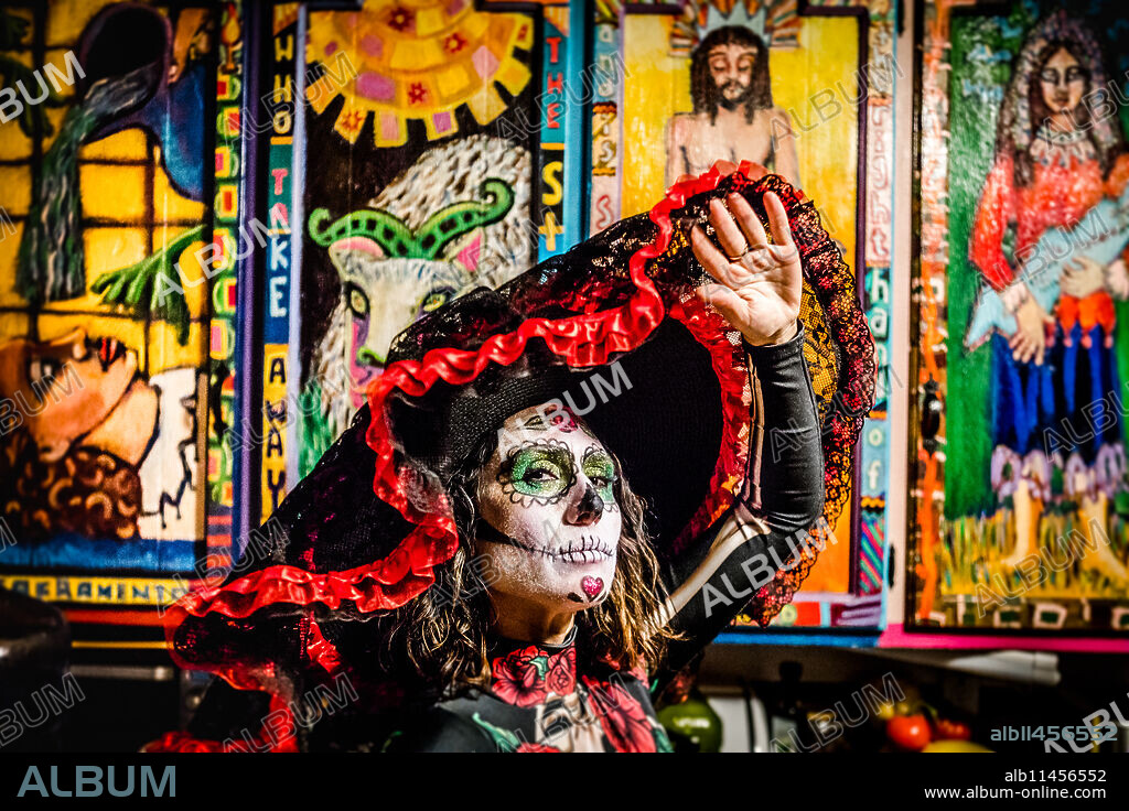 Woman in Dia de los Muertos makeup and costume, Day of the Dead celebration in the desert, California, United States of America, North America.