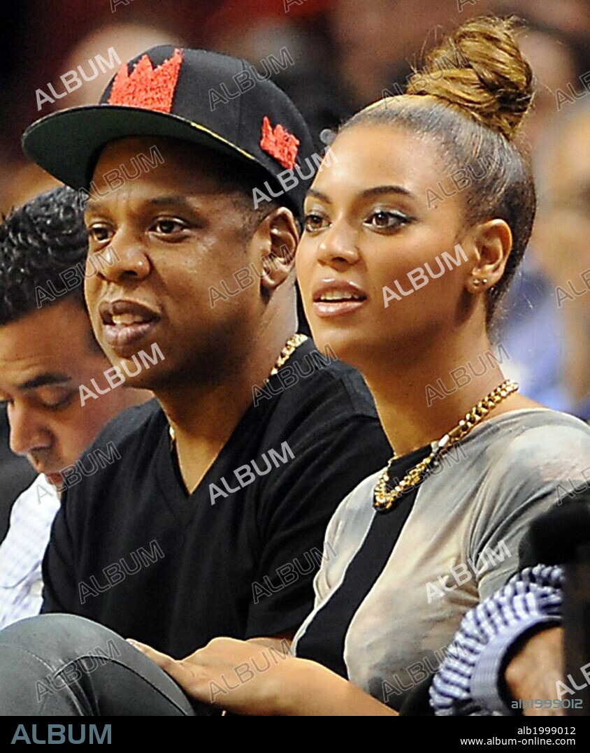 BEYONCE and JAY Z. Dec. 10, 2012 - Miami, Florida, U.S. - Music giants JAY-Z and BEYONCE attend the Miami Heat vs. Atlanta Hawks' basketball game at American Airlines Arena. 10/12/2012