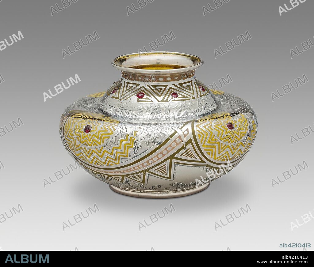 Pueblo Vase. George Paulding Farnham; American, 1859-1927; Tiffany and Company; American, founded 1837; New York, New York. Date: 1893. Dimensions: 6.4 × 9.2 × 9.2 cm (2 1/2 × 3 5/8 × 3 5/8 in.). Sterling silver inlaid with yellow, green, and pink enamel, set with twelve faceted rubies. Origin: New York City.