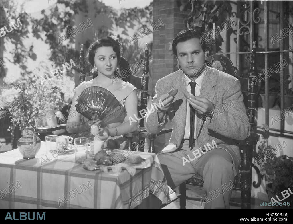 MARUJITA DIAZ and RUBEN ROJO in PUEBLA DE LAS MUJERES, 1953, directed by ANTONIO DEL AMO. Copyright TEIDE, P.C.