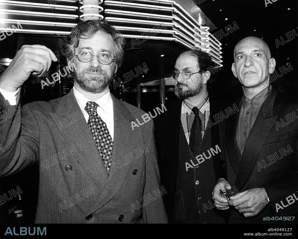 Steven Spielberg (1947- ), American Film maker, Salman Rushdie (1947- ), Indian writer, and Ben Kingsley, (1943- ), British actor, 1994. At the premiere of the motion picture 'Schindler's List'.