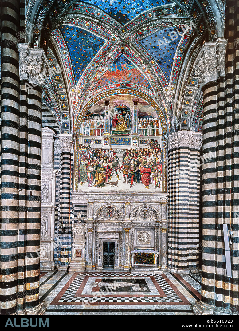 Siena, Duomo (Cathedral): the exterior of the Piccolomini Library. with the marble façade by Lorenzo di Mariano Fucci, known as Marrina e Giovanni di Stefano, 1497-99. In the upper register, Coronation of Pope Pius III, by Bernardino di Betto, known as Pinturicchio.