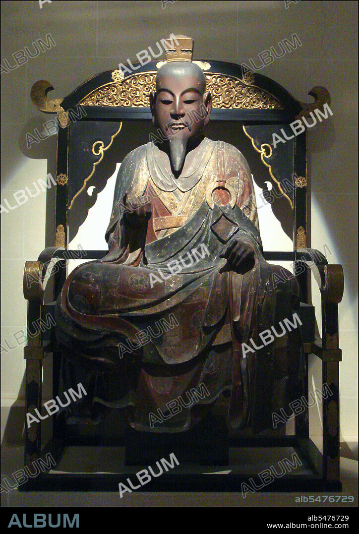 Prince Shotoku (Shotoku Taishi, 574–622), also known as Prince Umayado, was a regent and a politician of the Asuka period in Japan. He was a member of the ruling Soga clan. Shotoku was appointed as regent (Sessho) in 593 by Empress Suiko. Shotoku, inspired by Buddha's teachings, succeeded in establishing a centralized government during his reign. In 603, he established the 12 official ranks at court. He is credited with promulgating a Seventeen-article constitution. The Prince was an ardent Buddhist and composed commentaries on the Lotus Sutra, the Vimalakirti Sutra, and the Sutra of Queen Srimala. He commissioned the Shitenno-ji Temple in Settsu province (present-day Osaka). Shotoku's name has been linked with Horyu-ji, a temple in Yamato province. Documentation at Horyu-ji claims that Suiko and Shotoku founded the temple in the year 607. Archaeological excavations in 1939 have confirmed that Prince Shotoku's palace, the Ikaruga-no-miya, stood in the eastern part of the current temple complex, where the To-in sits today. China's Sui Emperor, Yangdi, dispatched a message in 605 that stated: 'The sovereign of Sui respectfully inquires about the sovereign of Wa'. Shotoku responded by sponsoring a mission led by Ono no Imoko in 607. The Prince's own message contains the earliest written instance in which the Japanese archipelago is named 'Nihon', literally, sun-origin (country). The salutation stated: 'From the sovereign of the land of the rising sun (nihon/hi izuru) to the sovereign of the land of the setting sun'. He is said to be buried at Shinaga, in the former Kawachi province (today Osaka prefecture). Wooden statue in Musee Guimet, Paris, picture by PHGCOM.