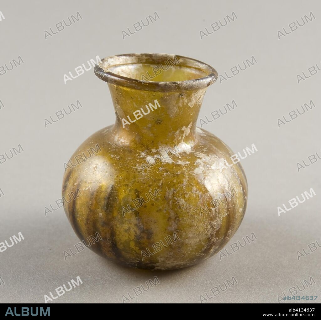 ANCIENT ROMAN. Jar. Roman; Levant or Syria. Date: 101 AD-300 AD. Dimensions: H. 6.9 cm (2 5/8 in.); diam. 7 cm (2 6/8 in.). Glass, blown technique. Origin: Syria.