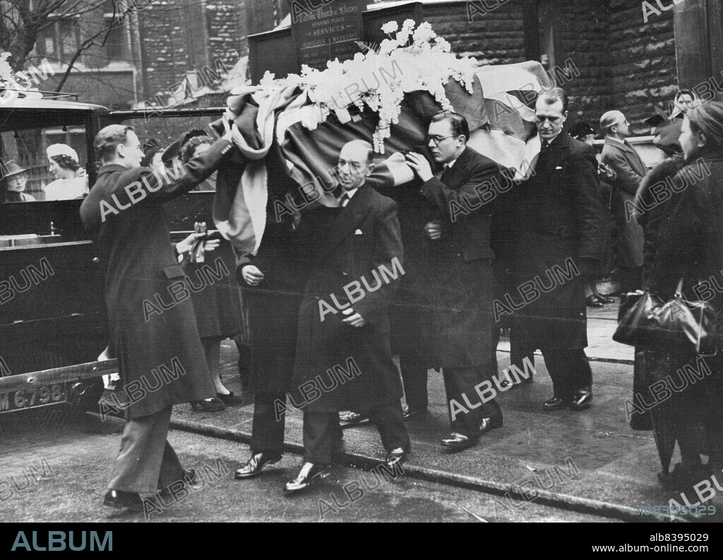 Funeral Of Richard TauberThe flower-laden coffin is carried from the church, after the service.The funeral of singer Richard Tauber took place at St. James', Spanish Place. January 12, 1948.