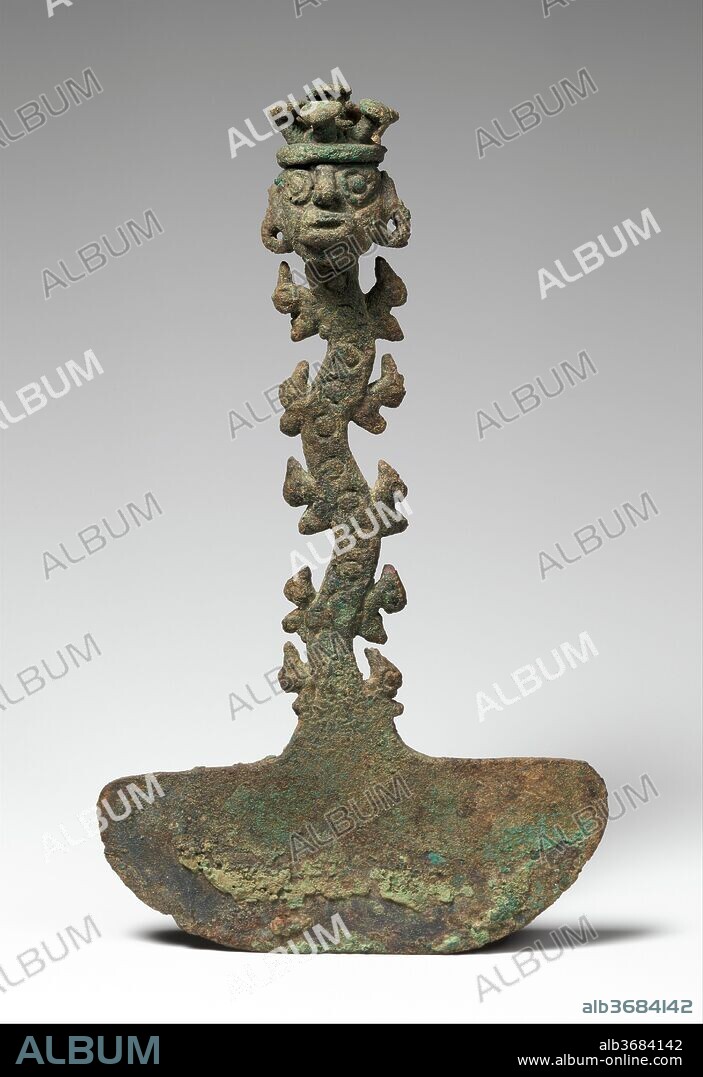 Ceremonial Knife (Tumi). Culture: Chimú. Dimensions: H. 5 13/16 in. (14.8 cm). Date: 12th-15th century.
The Moche people of northern Peru (first-seventh century) were among the first to use copper, often with the addition of arsenic to harden the metal and improve the quality of the cast. Moche metalworkers hammered most of their precious metals--gold and silver--into objects of sheet metal, but many works in copper were cast by the lost-wax technique. The Chimú people, who made this ceremonial knife, inherited the rich cultural and artistic traditions developed by the earlier Moche. Clearly a ritual object, indicated by the delicate, projecting details and attractive silhouette, the knife has a semicircular blade. The flat undulating shaft is embellished with circles in relief; stylized birds project from its sides. At the top is a human head wearing a headdress with mushroom shapes. The detailed facial features--wide staring eyes and open mouth framed by age wrinkles--give the face a startled look. The holes in the earlobes once held ornaments. The object is cast of a copper/arsenic alloy; its surface is now covered with copper corrosion developed over many centuries of burial.