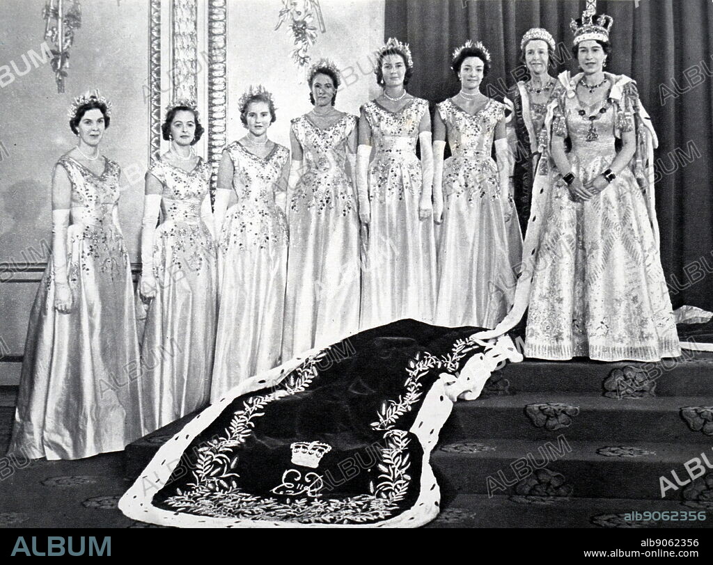 Queen Elizabeth II with her Mistress of the Robes and the six Maids of Honour after her coronation. 1953.