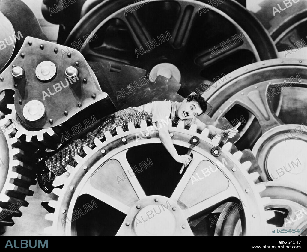 CHARLIE CHAPLIN en TIEMPOS MODERNOS, 1936 (MODERN TIMES), dirigida por CHARLES CHAPLIN. Copyright CHAPLIN/UNITED ARTISTS.
