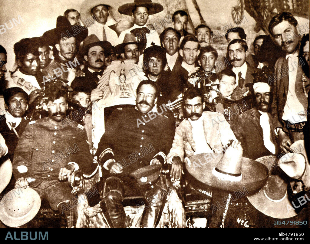 Pancho VILLA (1878-1923) dans le trone presidentiel, Emiliano ZAPATA (vers 1877-1919), Tomas URBINA et Otillo MONTANO (avec la tete bandee). Photographie anonyme vers 1910. credit : Collection NBL/Kharbine-Tapabor.