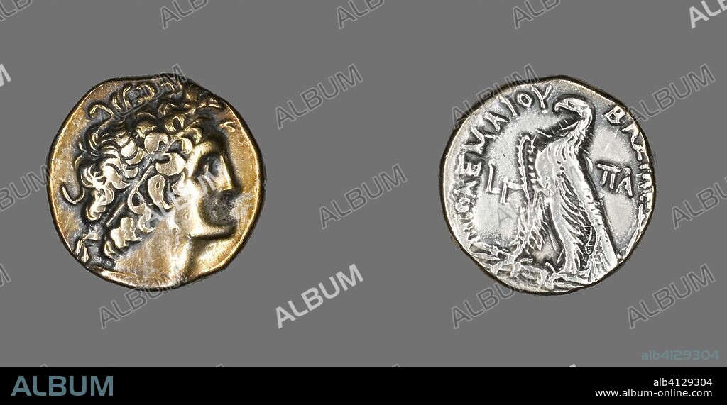 ANCIENT GREEK. Tetradrachm (Coin) Portraying Ptolemy I. Greco-Egyptian. Date: 176 BC-175 BC. Dimensions: Diam. 2.5 cm; 10.17 g. Silver. Origin: Ancient Egypt.