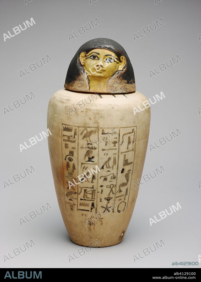 ANCIENT EGYPTIAN. Canopic Jar of the Overseer of the Builders of Amun, Amenhotep. Egyptian. Date: 1427 BC-1400 BC. Dimensions: a (jar):  30.4 × 19 × 19 cm (12 × 7 1/5 × 7 1/5 in.)
b (lid): 13.3 × 13.3 × 13.3 cm (5 1/4 × 5 1/4 × 5 1/4 in.). Terra-cotta and pigment. Origin: Egypt.