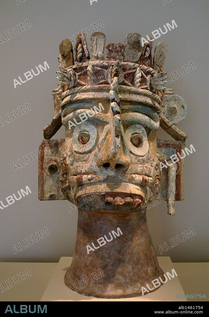 ARTE PRECOLOMBINO. CULTURA MIXTECA. MEXICO. CABEZA DEL DIOS DE LA LLUVIA TLALOC. Teotitlan del Camino (Estado de Oaxaca). Periodo Postclásico (1300-1500). Museo de Arte de Dallas (Dallas Museum of Art). Estado de Texas. Estados Unidos.