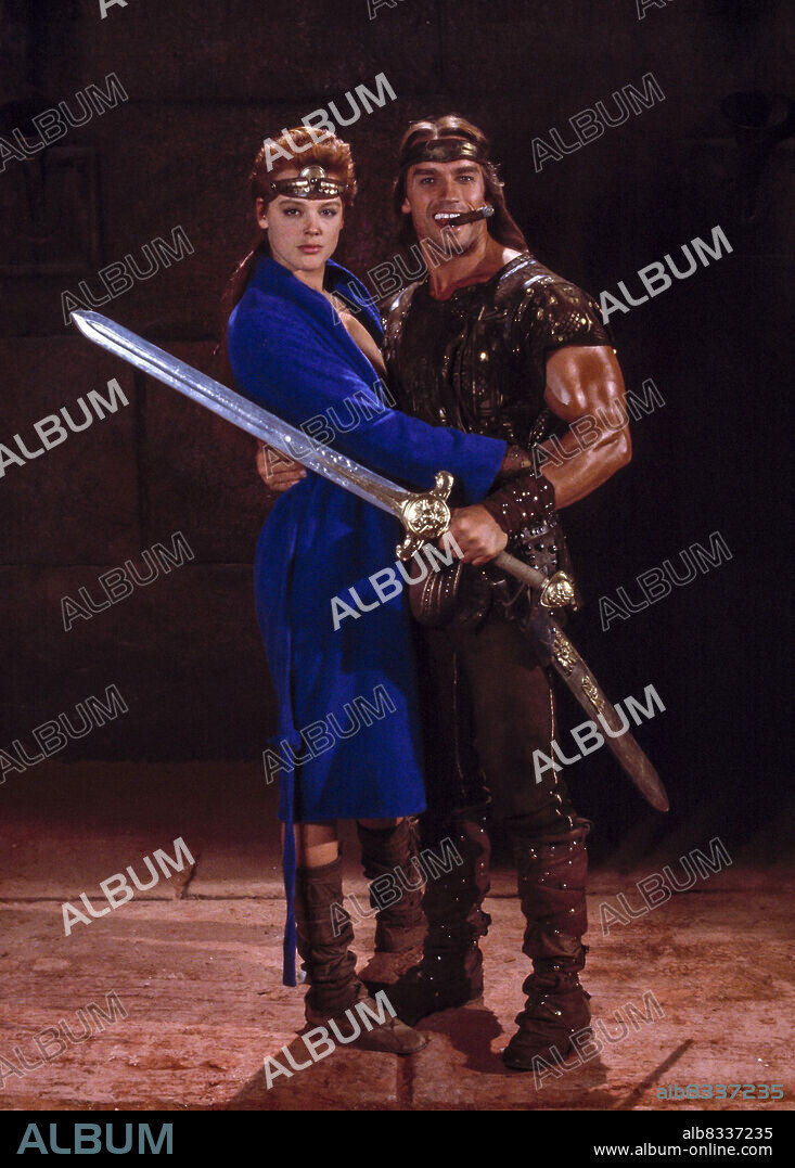 ARNOLD SCHWARZENEGGER and BRIGITTE NIELSEN in RED SONJA, 1985, directed by RICHARD FLEISCHER. Copyright M.G.M/UNITED ARTIST.
