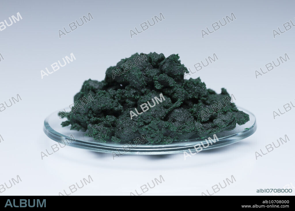 Chromium(III) chloride. Chromium(III) chloride hexahydrate (CrCl3 6H2O) in a watch glass.