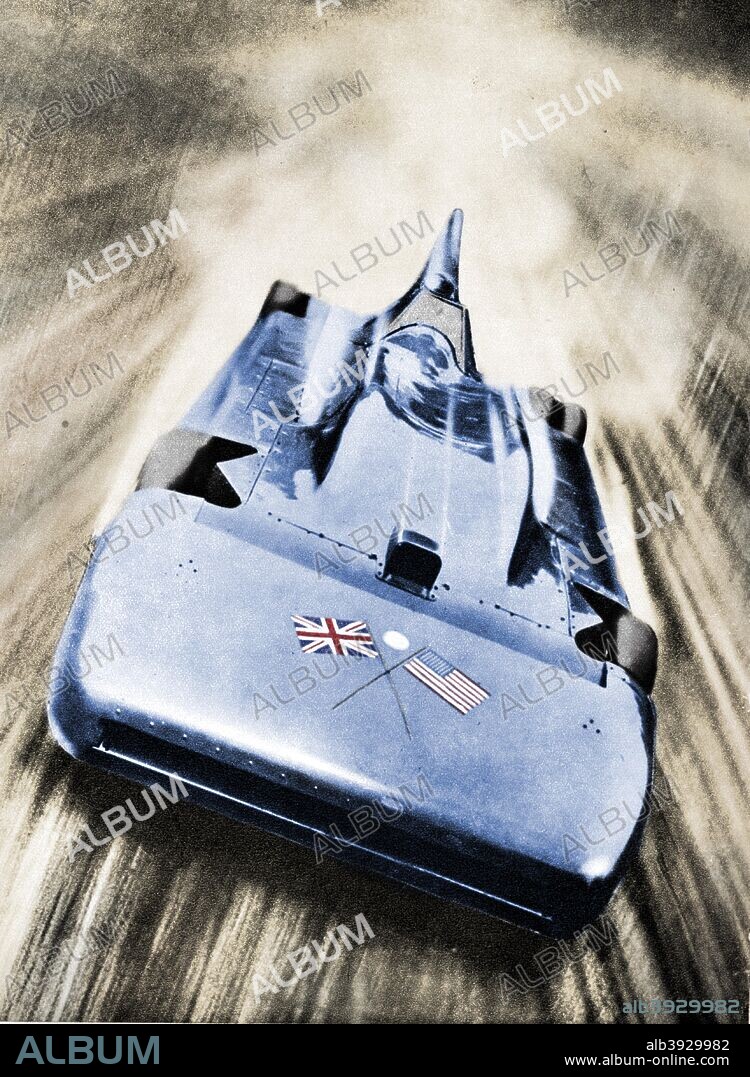 Sir Malcolm Campbell at high speed in `Blue Bird`, 1935. Campbell set a new land speed record of over 276 miles per hour on 12 March at Bonneville Salt Flats in Utah. From The Royal Jubilee Book 1910-1935 [Associated Newspapers Ltd., London, 1935]. (Colorised black and white print).