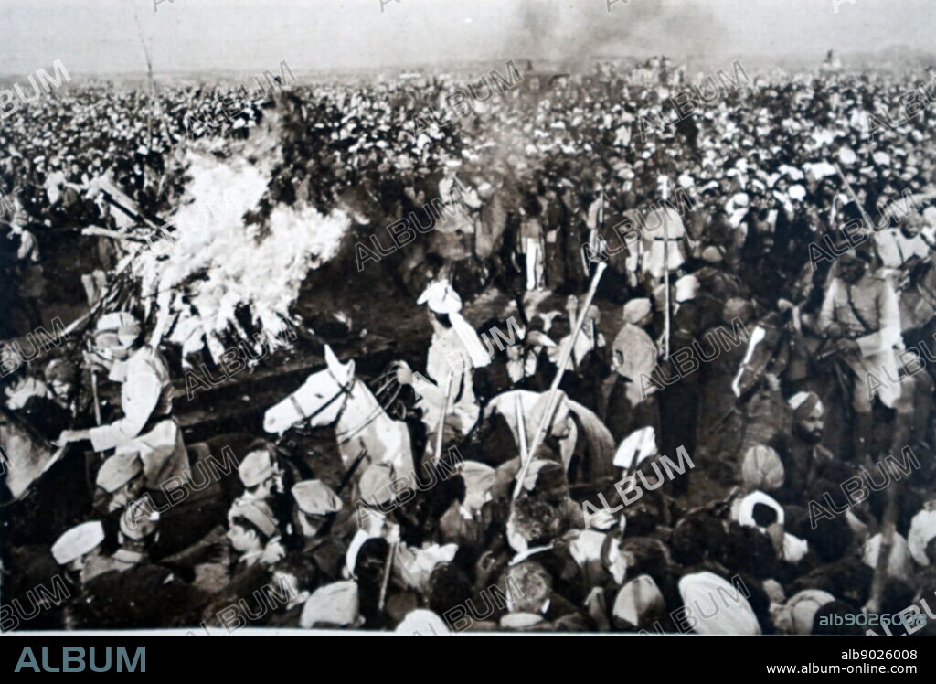 Photograph taking during the cremation of Mahatma Gandhi. Mohandas Karamchand Gandhi (1869-1948) an Indian lawyer, anti-colonial nationalist, and political ethicist.