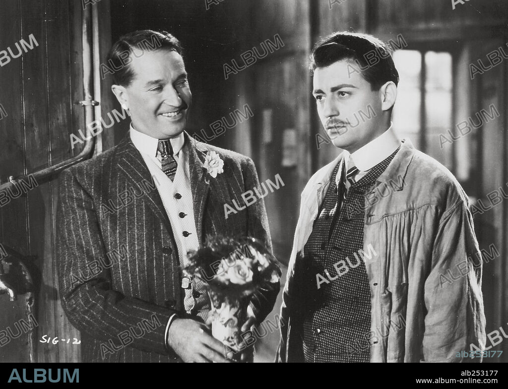 FRANCOIS PERIER and MAURICE CHEVALIER in MAN ABOUT TOWN, 1947 (LE SILENCE EST D'OR), directed by RENE CLAIR. Copyright RKO.
