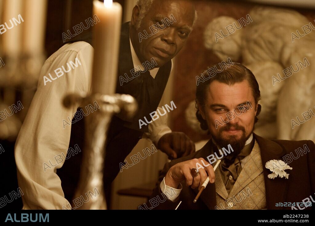 di caprio and SAMUEL L. JACKSON. Leonardo DiCaprio and SAMUEL L. JACKSON in DJANGO UNCHAINED, 2012, directed by QUENTIN TARANTINO. Copyright COLUMBIA PICTURES.