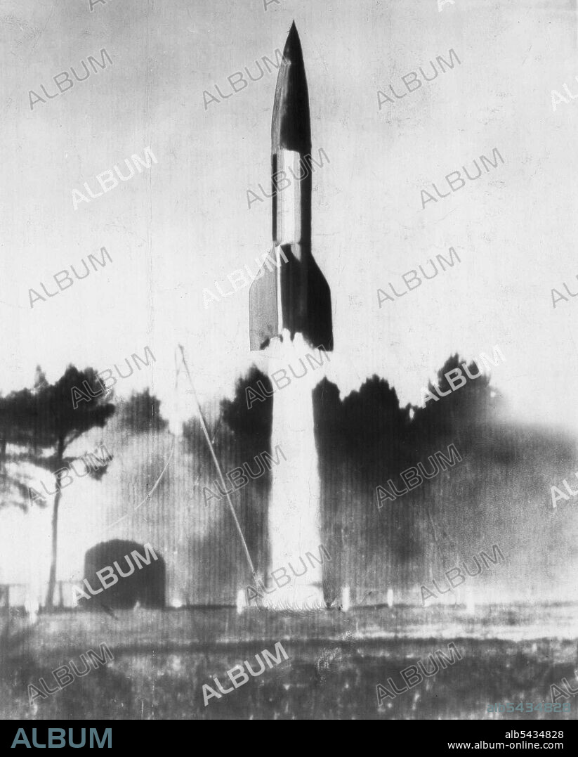 Nazi V-2 Takes Off -- A German V-2 Rocket speeds upward 40 feet from the ground. At Cuxhaven, Germany, Aimed at a target 150 miles away in the North Sea. The Rocket was assembled from Parts of rockets fired by Germans during the war. British made test to study efficiently of the German "secret". October 16, 1945. (Photo by AP Wirephoto).