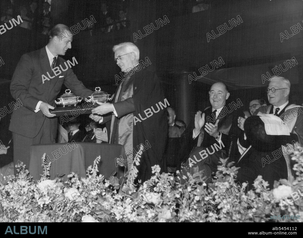 Duke of Edinburgh Makes Presentation To Penicillin Founder. The Duke of presentation to Sir Alexander Fleming at St. Mary's Hospital, today. The Duke of Edinburgh presented to Sir Alexander Fleming, on Behlaf of St. Mary's Hospital Medical school, Paddington, a pair of silver George III Sauge Tureens, to mark the 25th Anniversary of his discovery of Penicillin. June 29, 1954. (Photo by Paul Popper, Paul Popper Ltd.).
