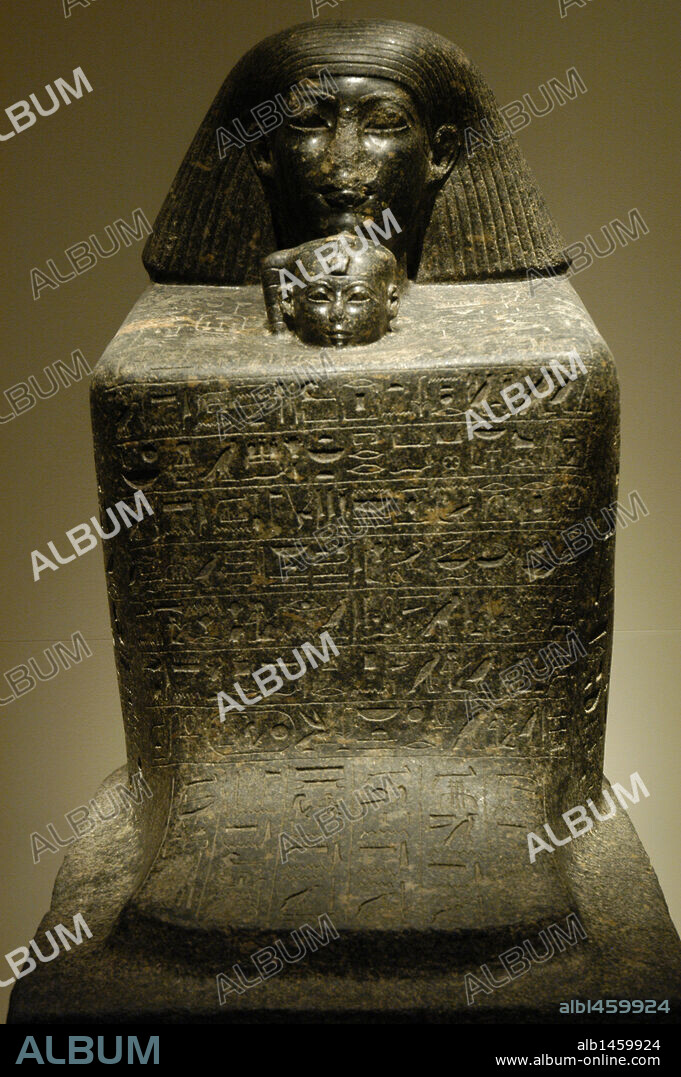 Egyptian Art. Statue-cube of Senenmut and Princess Neferure. Senenmut was architect and royal chancellor during the reign of Hatshepsut and guardian of her daughter, Neferure. Granite sculpture, from Thebes or Karnak. New Kingdom. 18th Dynasty. (1473-1458 B.C.). Egyptian Museum (Altes Museum). Berlin. Germany.
