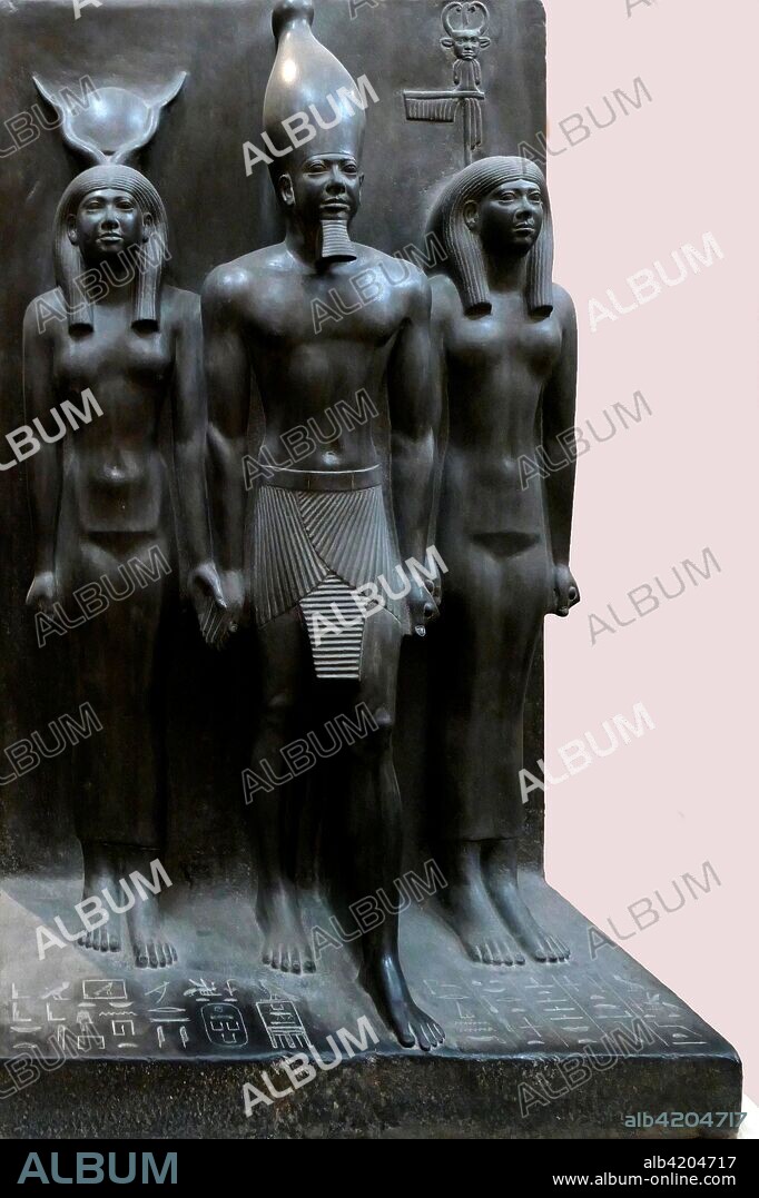 King Menkaure flanked by Hathor and a Goddess. 2490-2472 BC. Statue in relief. from Giza. Egypt.
