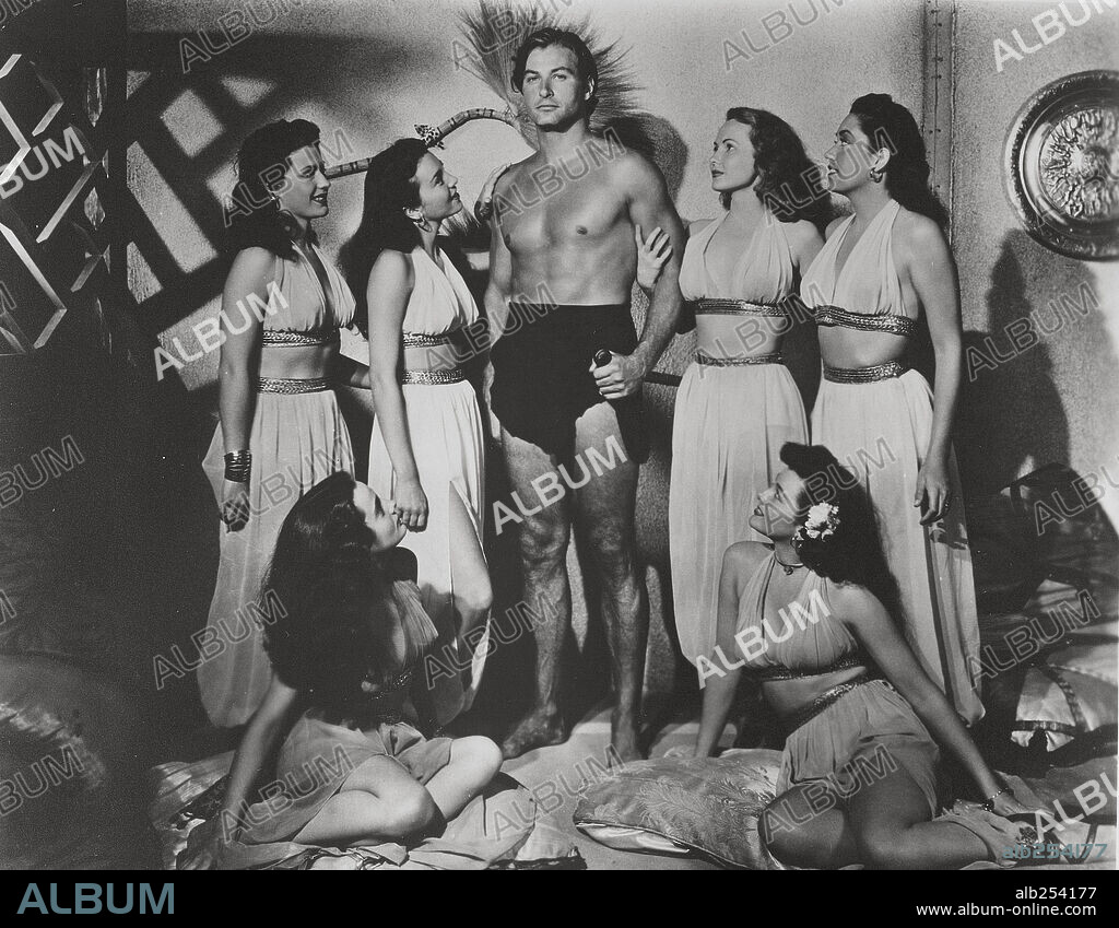 LEX BARKER in TARZAN AND THE SLAVE GIRL, 1950, directed by LEE SHOLEM. Copyright RKO.