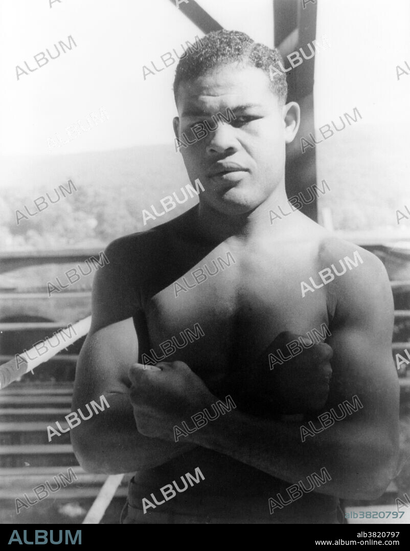 Entitled: "Portrait of Joe Louis, Greenwood Lake, New York." Joseph Louis Barrow (May 13, 1914 - April 12, 1981) was an African-American professional boxer and the World Heavyweight Champion from 1937-49. He made 25 defenses of his Heavyweight title and was a world champion for 11 years and 10 months. Both are still records in the heavyweight division, the former in any division. In 2005, Louis was ranked as the #1 heavyweight of all-time by the International Boxing Research Organization, and was ranked #1 on The Ring's list of the 100 Greatest Punchers of All-Time. He is widely regarded as the first African-American to achieve the status of a nationwide hero within the USA, and was also a focal point of anti-Nazi sentiment leading up to and during WWII. He was instrumental in integrating the game of golf, breaking the sport's color barrier in America by appearing under a sponsor's exemption in a PGA event in 1952. He died of cardiac arrest in 1981, at the age of 66. President Reagan waived the eligibility rules for burial at Arlington National Cemetery and Louis was buried there with full military honors. His funeral was paid for in part by former competitor and friend, Max Schmeling, who also acted as a pallbearer. Photographed by Carl Van Vechten September 15, 1941.