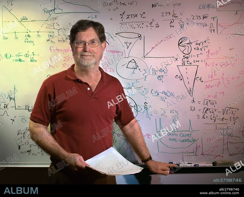 Smoot at whiteboard in office. George Fitzgerald Smoot III (born February 20, 1945) is an American astrophysicist, cosmologist, Nobel laureate, and one of two contestants to win the $1 million prize on "Are You Smarter than a 5th Grader?". He won the Nobel Prize in Physics in 2006 for his work on the Cosmic Background Explorer with John C. Mather that led to the "discovery of the black body form and anisotropy of the cosmic microwave background radiation". This work helped further the Big Bang theory of the universe using the Cosmic Background Explorer (COBE) satellite. Currently Smoot is a professor of physics at the University of California, Berkeley, senior scientist at the Lawrence Berkeley National Laboratory, and since 2010, a professor of physics at the Paris Diderot University, France. In 2003, he was awarded the Einstein Medal and the Oersted Medal in 2009. Ohotogrpah not dated.