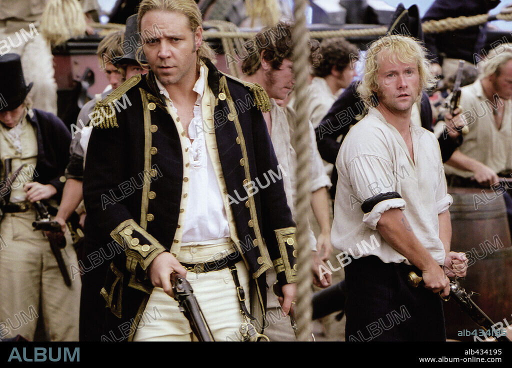 BILLY BOYD and RUSSELL CROWE in MASTER AND COMMANDER: THE FAR SIDE OF THE WORLD, 2003, directed by PETER WEIR. Copyright 20TH CENTURY FOX/MIRAMAX/UNIVERSAL/SAMUEL GOLDWYN FILMS.