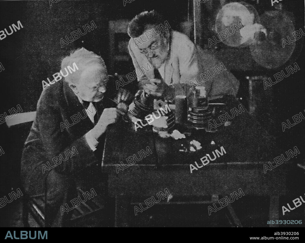 'Edison and Steinmetz Join Forces to Achieve Success', 1922, (c1925). Thomas Alva Edison, (1847-1931), American inventor and businessman. Charles Proteus Steinmetz (1865-1923), mathematician and electrical engineer. From Cassell's Romance of Famous Lives, Volume 1 by Harold Wheeler. [The Waverley Book Company, Ltd., London, c1925].