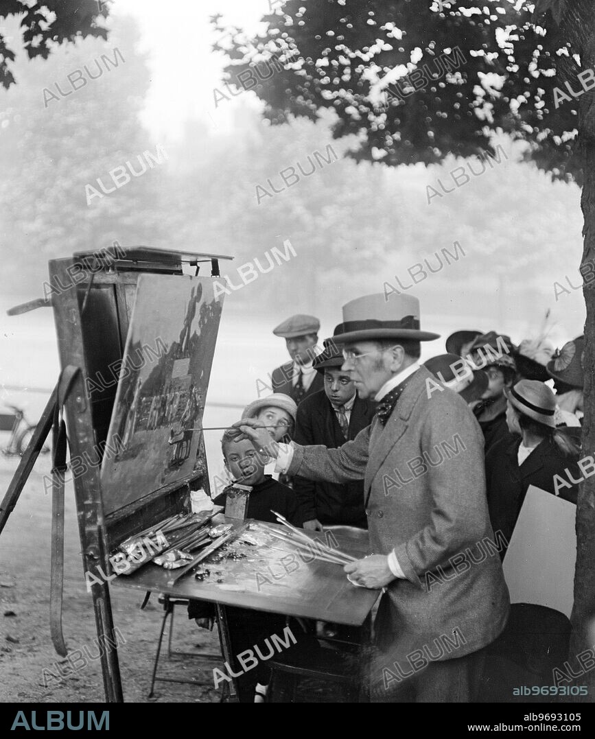 Mr John Lavery painting ' The Heroes of Loos ' in the park .. 23 August 1916. Sir John Lavery (20 March 1856 to 10 January 1941) was an Irish painter best known for his portraits. He was appointed Official War Artist for the Great War but ill health and a serious car crash during a Zeppelin raid prevented him from travelling to the Front.