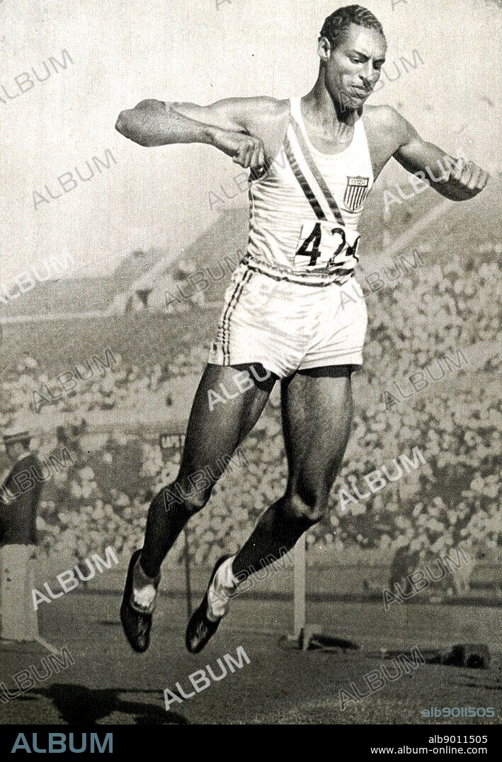 Photograph of Edward Lansing "Ed" Gordon, Jr. (1908 - 1971) competing in the long jump during the 1932 Olympic games. Edward won Gold jumping 7.64 meters.