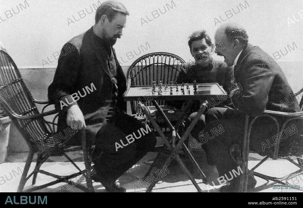 Photograph of Vladimir Lenin (1870-1924) and Alexander Bogdanov (1873-1928) playing chess during a visit to Maxim Gorky (1868-1936). Capri Italy. Dated 1908 .