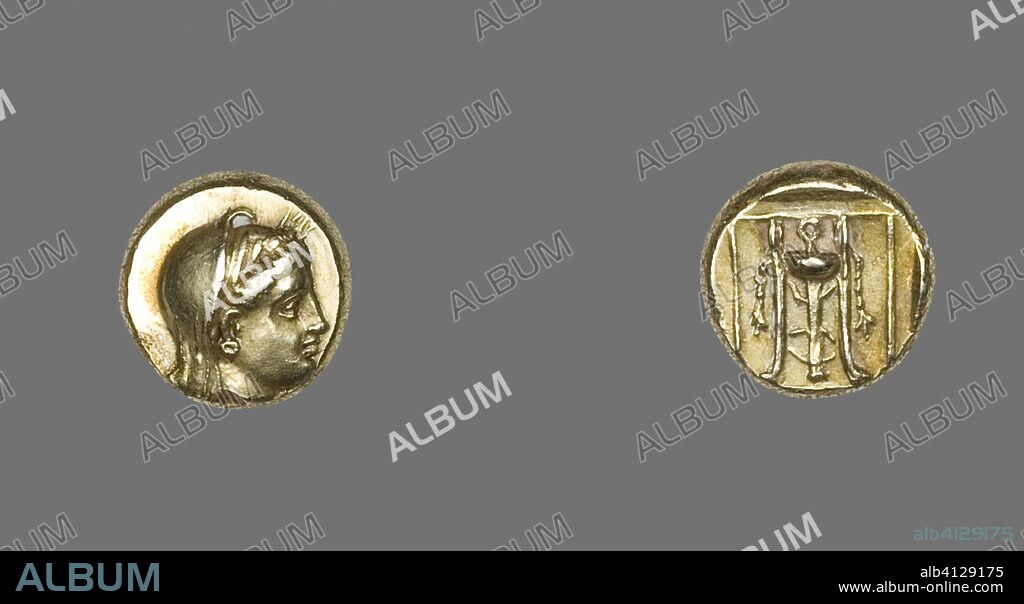 ANCIENT GREEK. Hecta (Coin) Depicting the Goddess Demeter. Greek, minted in Lesbos, probably Mytilene. Date: 400 BC-350 BC. Dimensions: Diam. 1.1 cm; 2.54 g. Electrum. Origin: Greece.