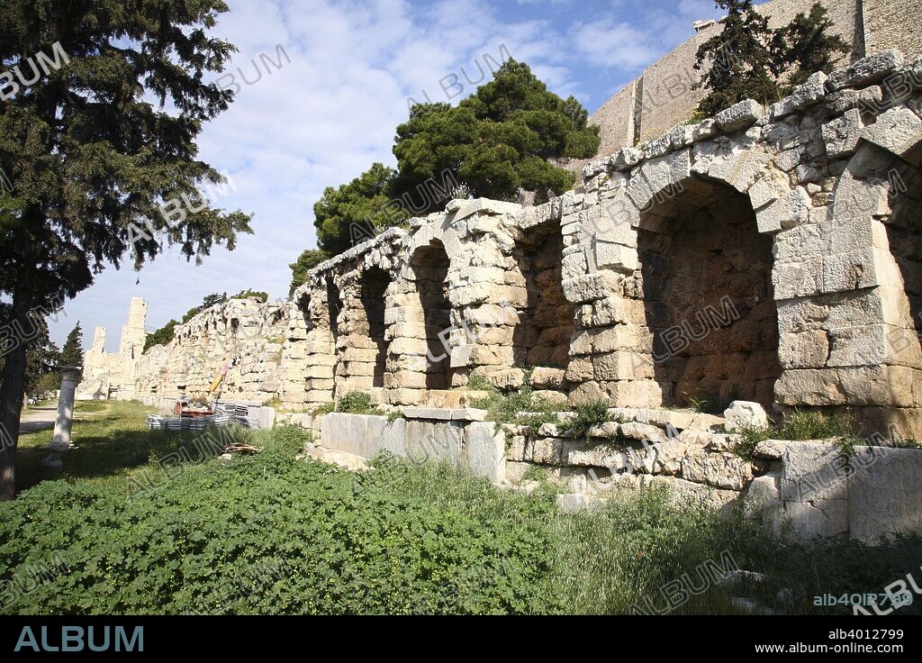 The Stoa of Eumenes II, The Acropolis, Athens, Greece. The Stoa of Eumenes was built by King Eumenes II of Pergamon (197-160 BC). It was designed as a spacious promenade for visitors to the Temple and Theatre of Dionysos. It was two-storied, with Doric columns on the exterior, Ionic columns in the interior on the ground floor and capitals of Pergamene type on the upper floor.