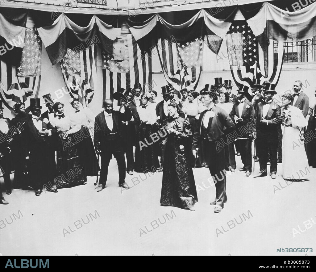 The Cakewalk, July 6th, 1897. The Cake-Walk or Cakewalk was a dance developed from the "Prize Walks" held in the late 19th century, generally at get-togethers on black slave plantations in the Southern United States. Alternative names for the original form of the dance were "chalkline-walk", and the "walk-around". At the conclusion of a performance of the original form of the dance in an exhibit at the 1876 Centennial Exposition in Philadelphia, an enormous cake was awarded to the winning couple. Thereafter it was performed in minstrel shows, exclusively by men until the 1890s. The inclusion of women in the cast "made possible all sorts of improvisations in the Walk, and the original was soon changed into a grotesque dance" which became very popular across the country.
