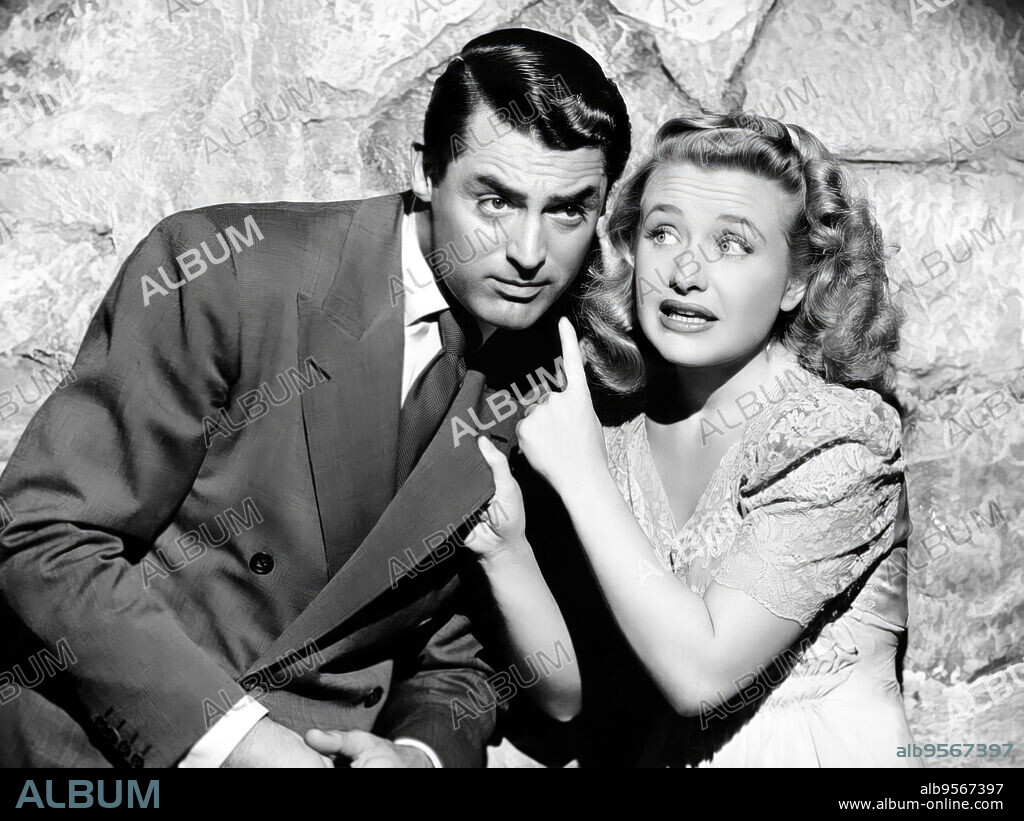 CARY GRANT and PRISCILLA LANE in ARSENIC AND OLD LACE, 1944, directed by FRANK CAPRA. Copyright WARNER BROTHERS.
