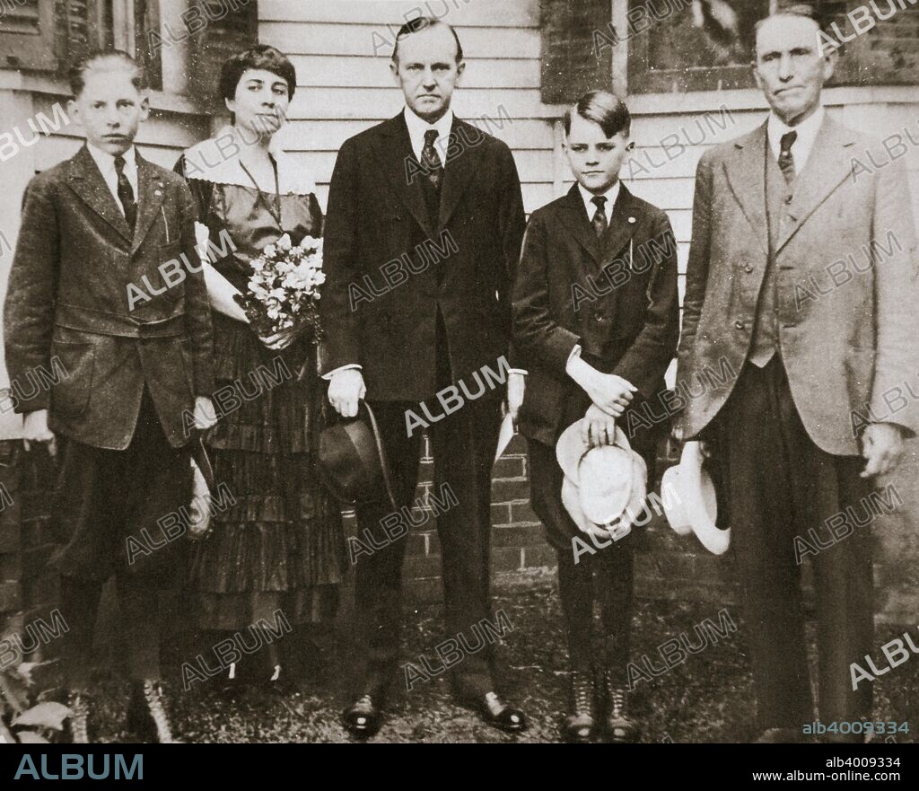 Calvin Coolidge, American politician, with his father, wife, and sons, 1920. John Calvin Coolidge, Jr (1872-1933) was Governor of Massachusetts at the time of the photograph. He went on to serve as President Warren G Harding's Vice-President before becoming the 30th President of the United States after Harding died from a heart attack in 1923. Coolidge is pictured with his wife, Grace (1879-1957), his sons John (1906-2000) and Calvin, Jr (1908-1924) and his father, John Calvin Coolidge, Sr (1845-1926).