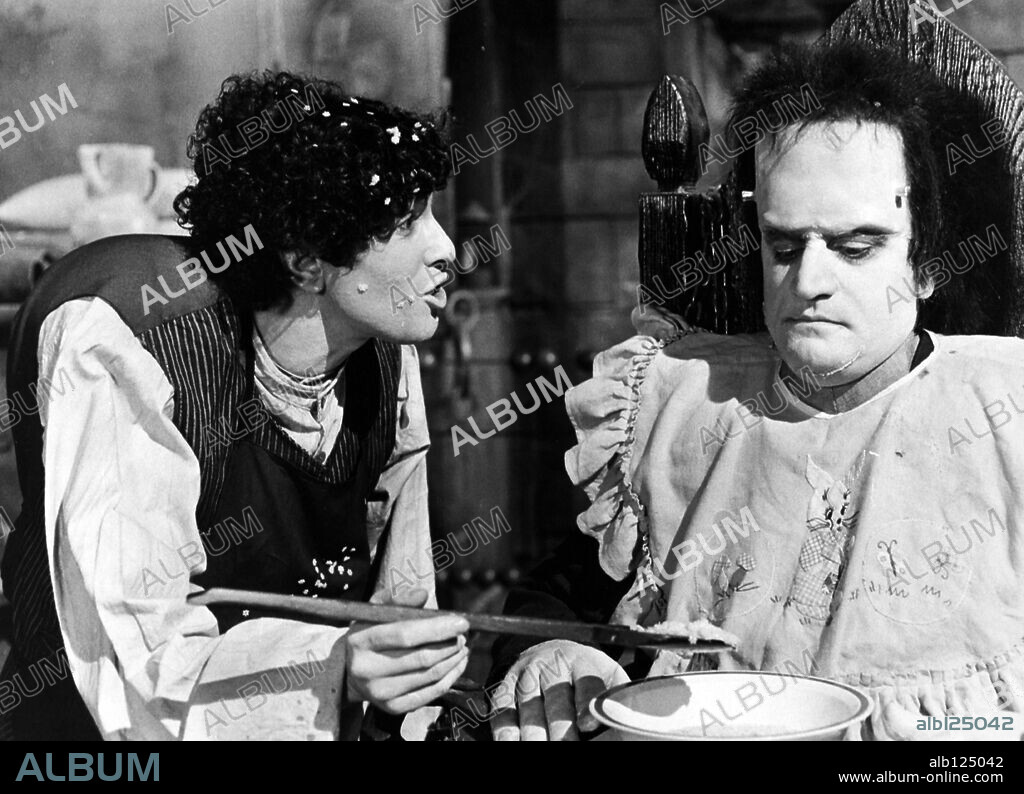 ALDO MACCIONE and NINETTO DAVOLI in FRANKENSTEIN: ITALIAN STYLE, 1975 (FRANKENSTEIN ALL'ITALIANA), directed by ARMANDO CRISPINO. Copyright R.P.A. CINEMATOGRAFICA.
