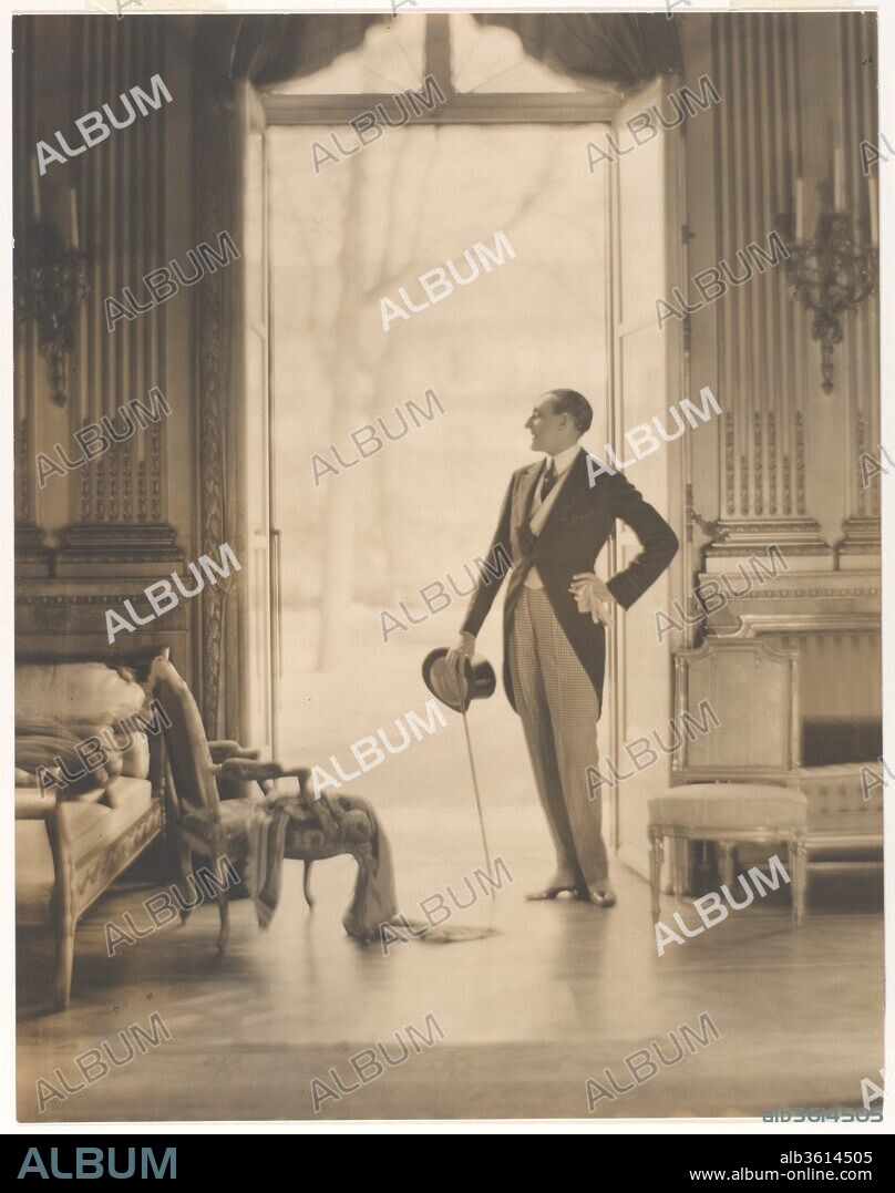 Etienne de Beaumont. Artist: Adolf de Meyer (American (born France), Paris 1868-1946 Los Angeles, California). Dimensions: 23.7 x 18.6 cm (9 5/16 x 7 5/16 in.). Person in Photograph: Count Etienne de Beaumont (French, 1883-1956). Date: ca. 1923.
An aristocrat and patron of the avant-garde, Count Etienne de Beaumont cuts a dashing figure here, posed in one of the grand salons of his hôtel (grand townhouse) in Paris's rue Masseran. The count hosted a series of legendary masquerade balls at his residence during the interwar period, attended by avant-garde artists such as Jean Cocteau, Pablo Picasso, and Man Ray. De Meyer described these parties, which he and Olga often attended, as "fêtes of unsurpassed magnificence" in a 1923 article for Harper's Bazaar.